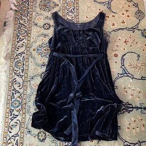 Navy blue velvet dress with satin tie.